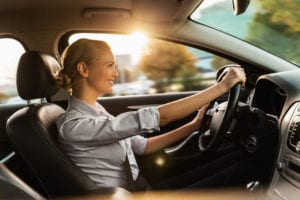 woman driving happy