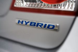 Hybrid logo on vehicle