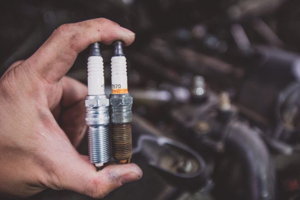 Reasons Why You Car is Vibrating When Idle: Worn Spark Plugs