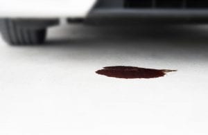 oil leak below automobile